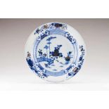 A charger Chinese export porcelain Blue underglaze and gilt decoration depicting garden view at the