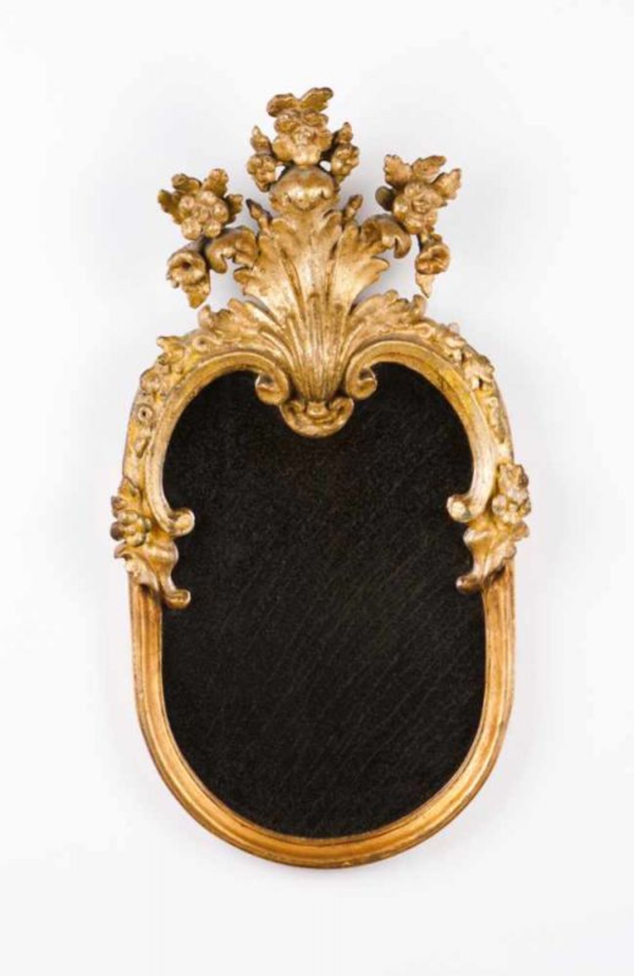 A pair of small wall mirrors Carved and gilt wood Europe, 19th century (small defects) 51x27 cm