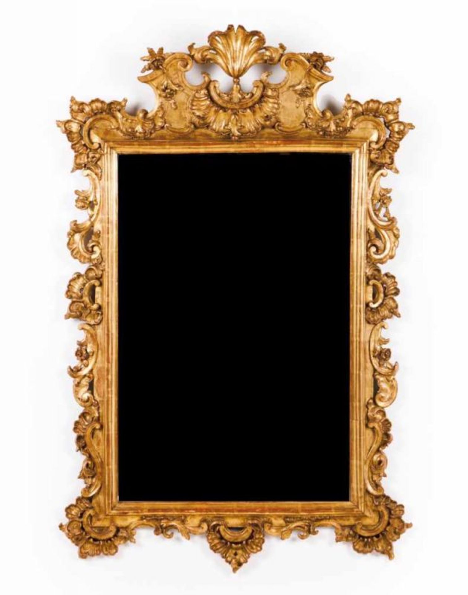 A wall mirror Carved and gilt wood Portugal, late 19th, early 20th century (small losses and