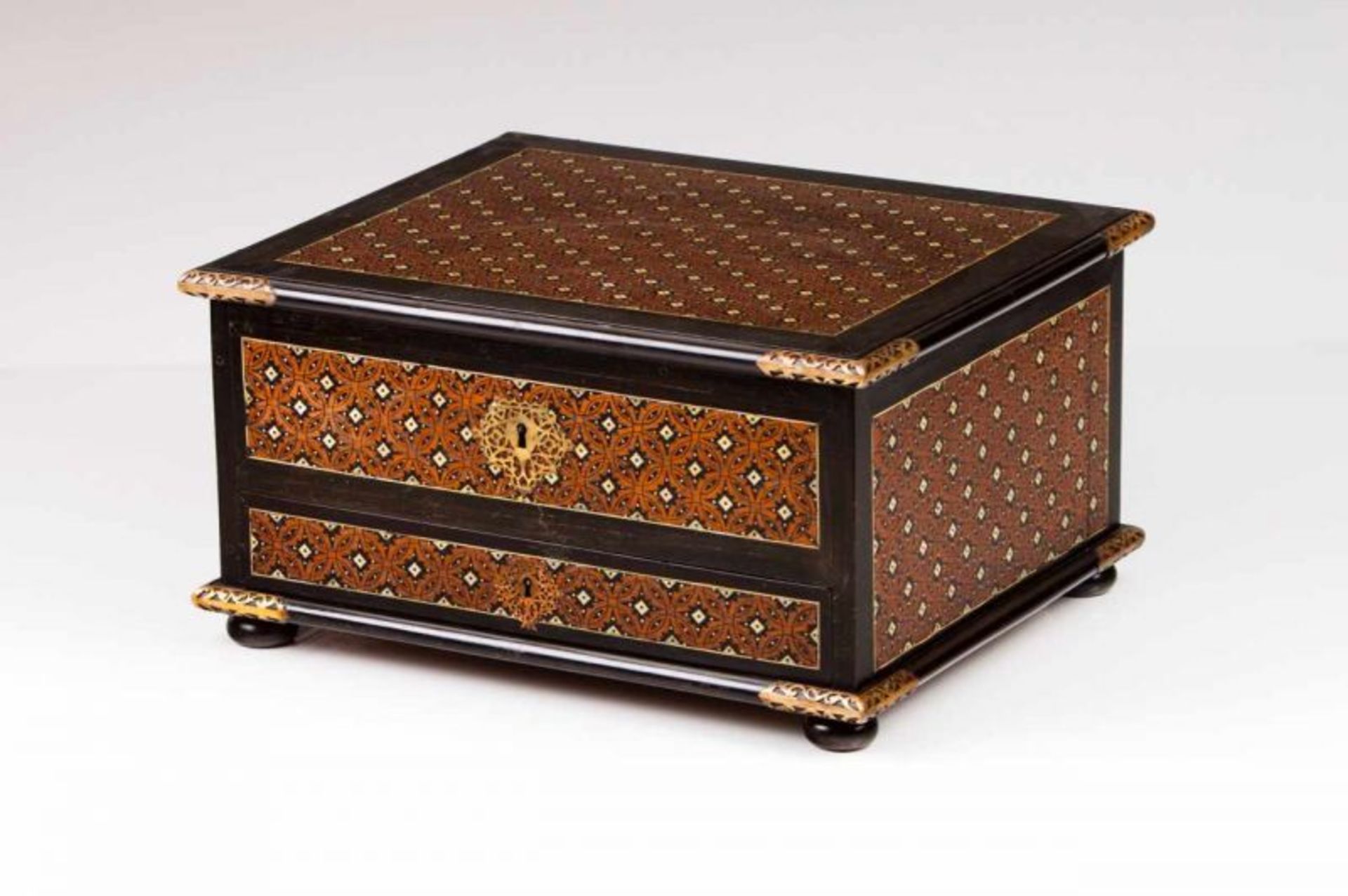 An Indo-Portuguese traveling cabinet Teak with Sissoo and ivory inlaid decoration Geometric pattern