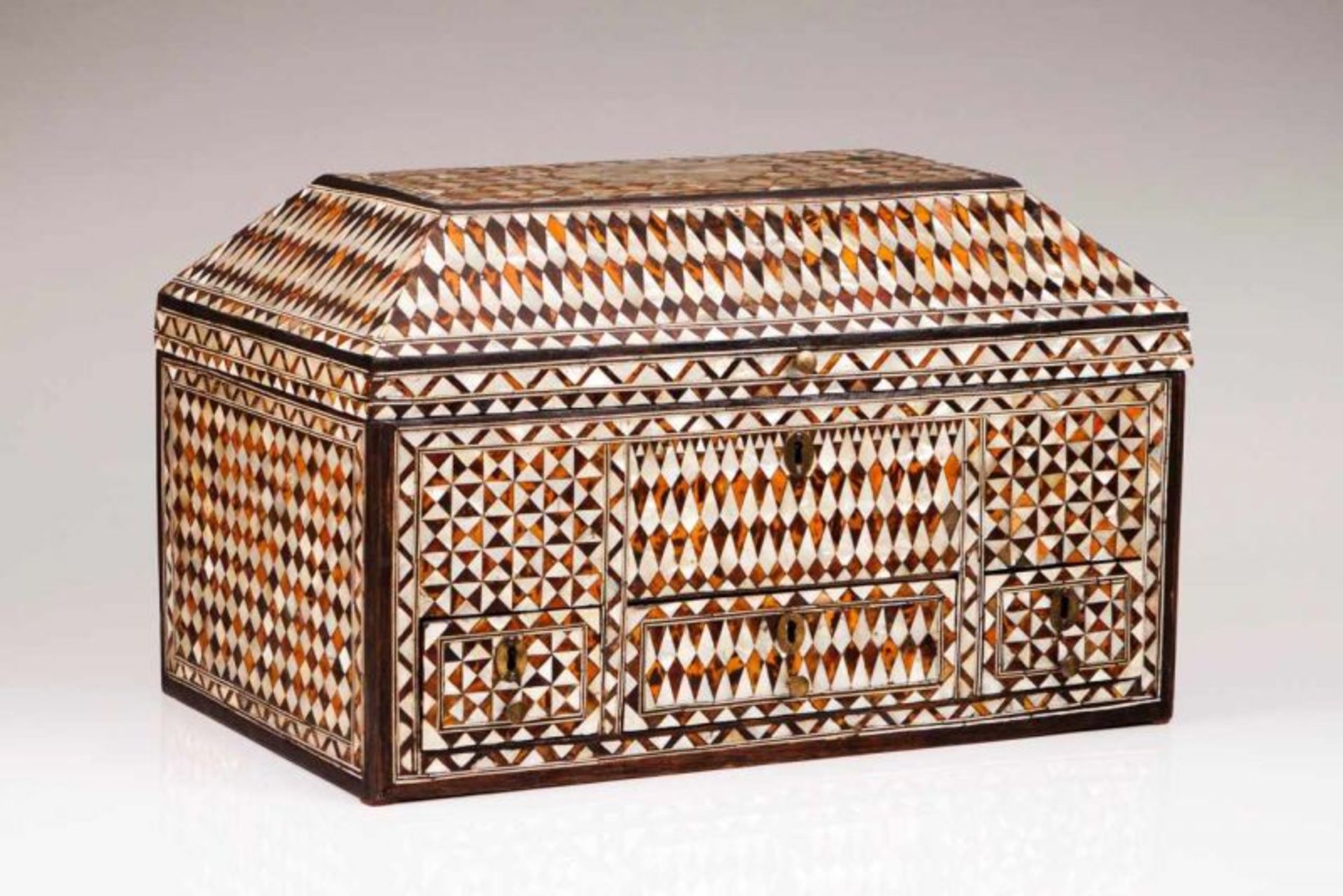 A marriage chest Wood with mother-of-pearl and tortoiseshell marquetry decoration forming geometric