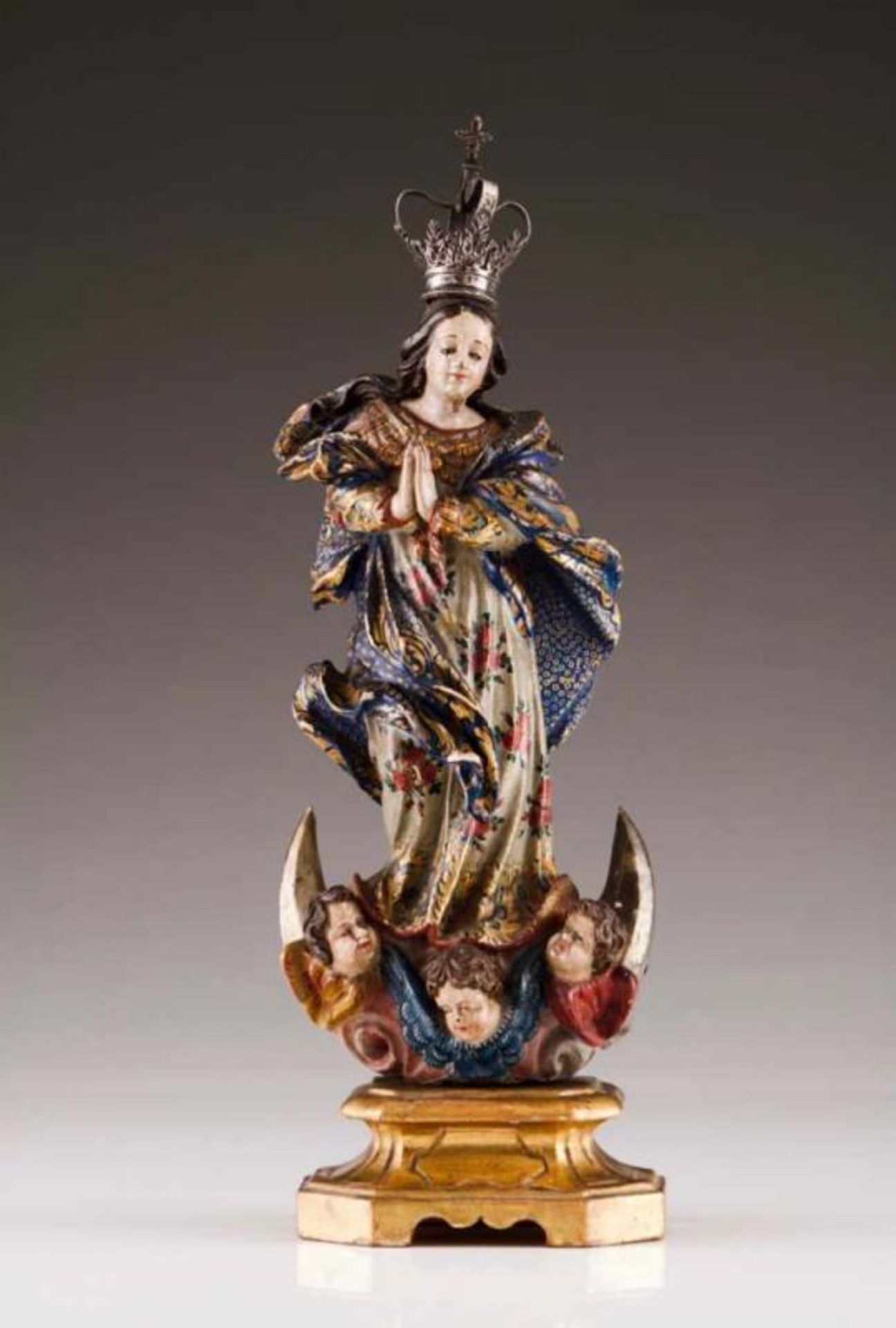 Our Lady of the Conception Polychrome and gilt wood sculpture On a crescent with cherubs Silver