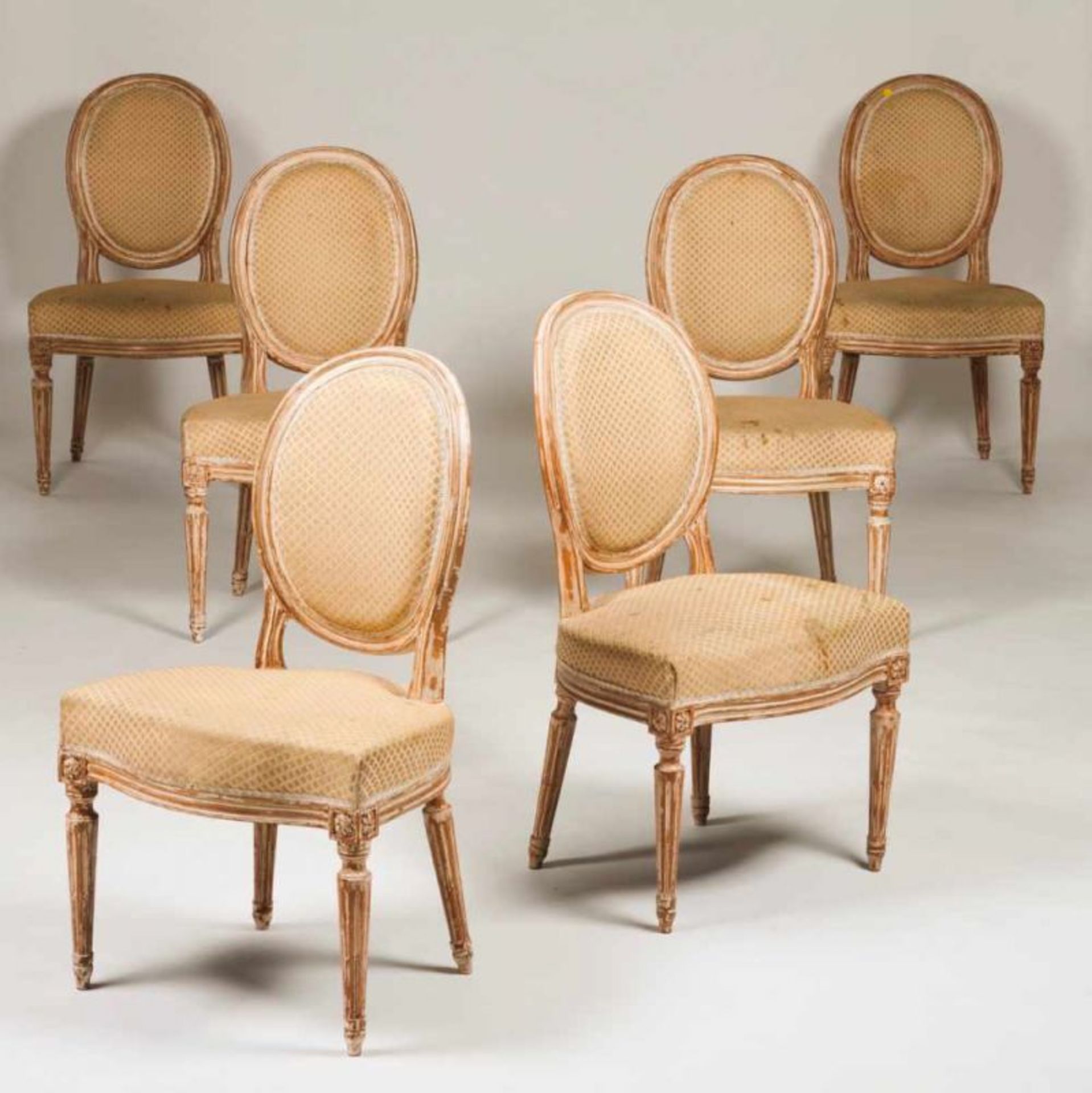 A set of six Louis XVI style chairs Painted wood Silk upholstered seats and backs 20th century (