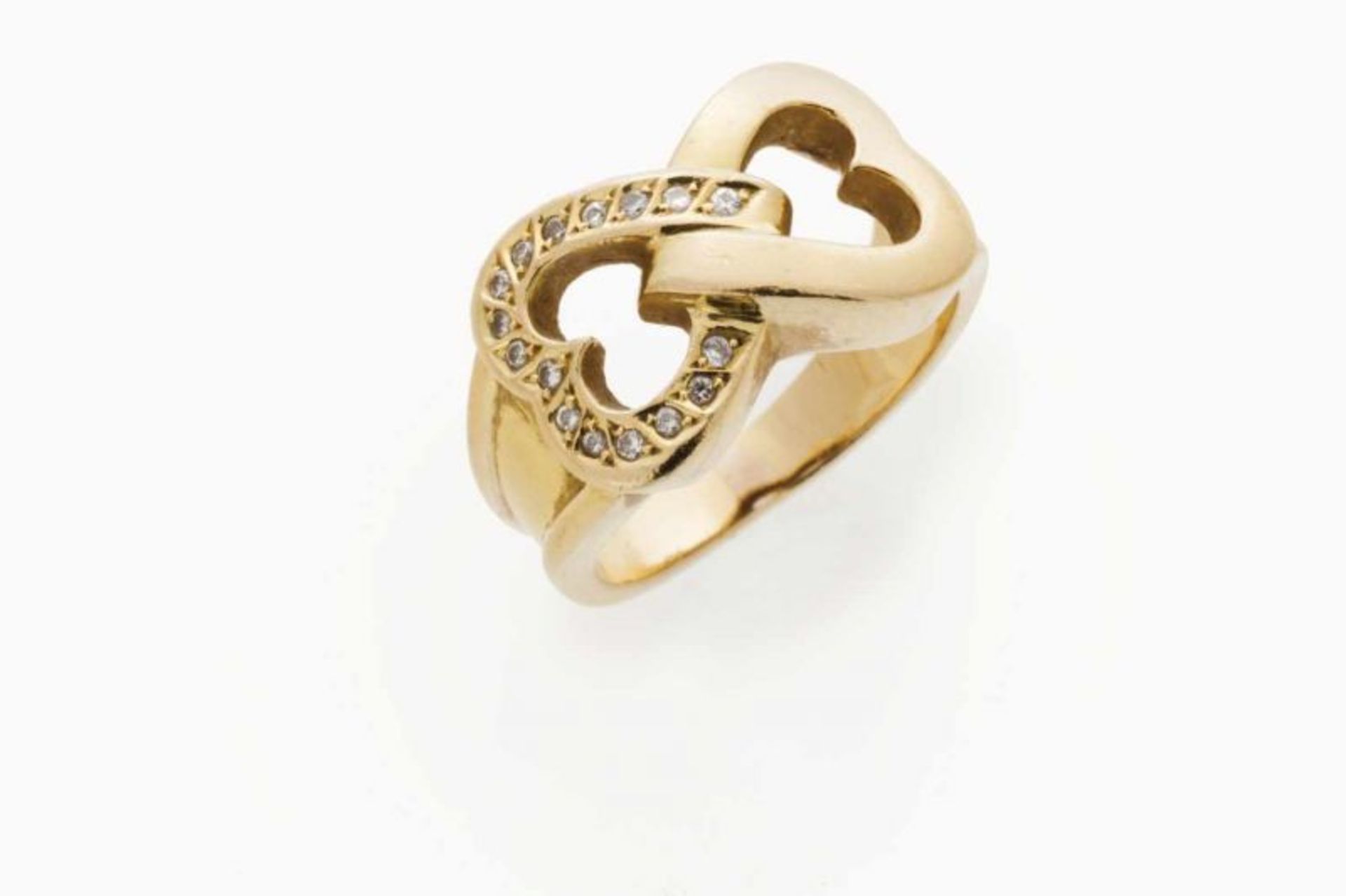 A ring Gold Designed as two hearts, set with small brilliant cut diamonds Portuguese assay mark (