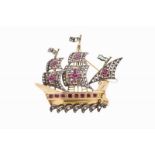 A "caravel" brooch Set in silver and gold with synthetic rubies, emeralds and rose cut diamonds