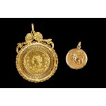 Two gold pendants 18kt and 19kt gold One with traditional decoration with coin imitation, the