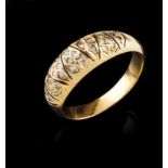 A ring Set in two-toned gold with small brilliant cut diamonds Portuguese assay mark (after 1985)