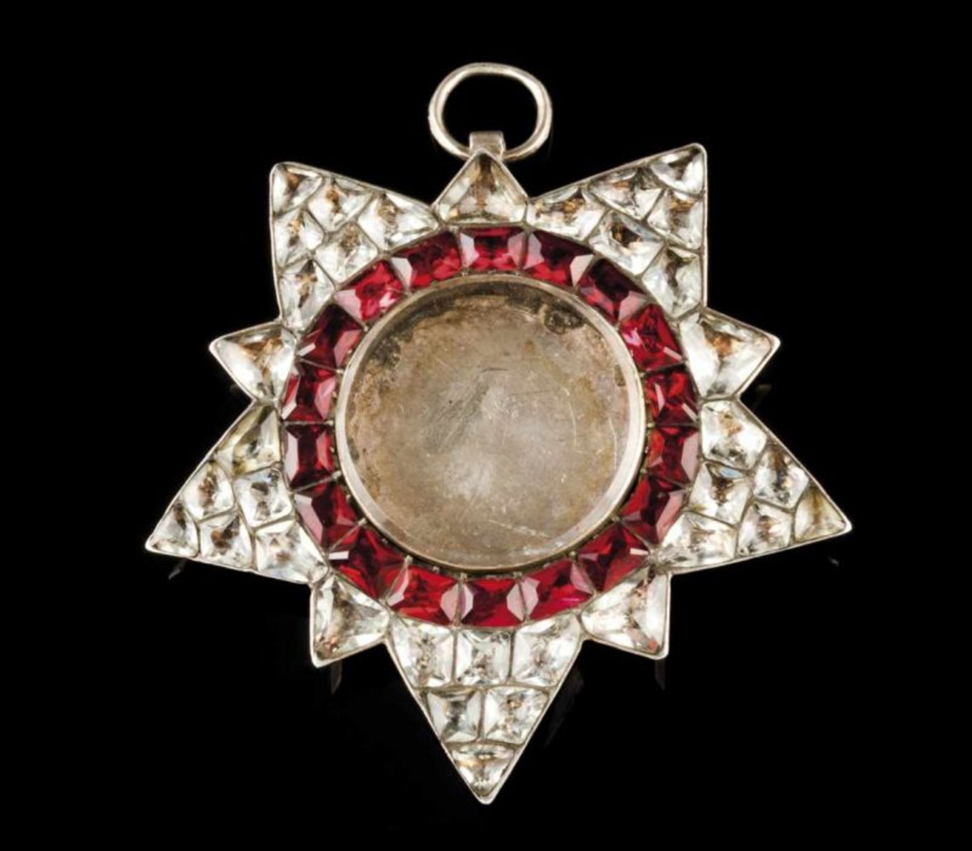 A Masonic pendant/ brooch Set in silver with colorless and red foiled pastes, centre with