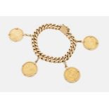 A charm bracelet Gold Curb links with four pendants with gold sovereigns, 1911, 1957, 1900 and