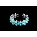 A gem-set bracelet Set in 18kt white gold with turquoise beads and 93 brilliant cut diamonds (ca.