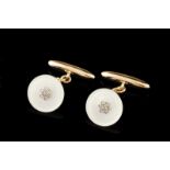 A pair of Art Deco cufflinks Gold with mother-of-pearl plaques and centres with small platinum