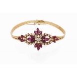 A bracelet Set in 18kt gold with 18 marquise cut rubies and 23 brilliant cut diamonds (ca. 1,26ct)