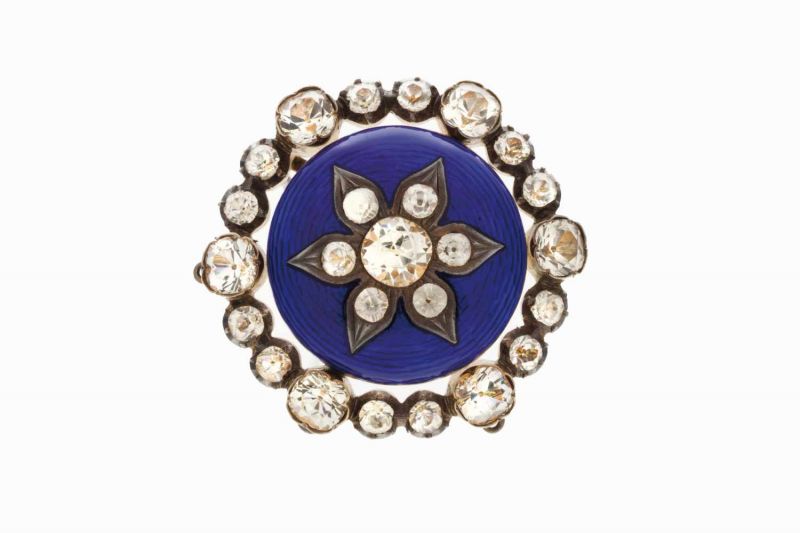 A brooch Silver gilt and cobalt-blue enamel set with old mine cut foiled pastes Europe, 19th century