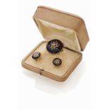 A set of pair of earrings and brooch Set in 14kt gold with onyx plaques, rose cut diamonds and one