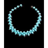 A gem-set necklace 18kt white gold set with turquoise beads and 151 brilliant cut diamonds (