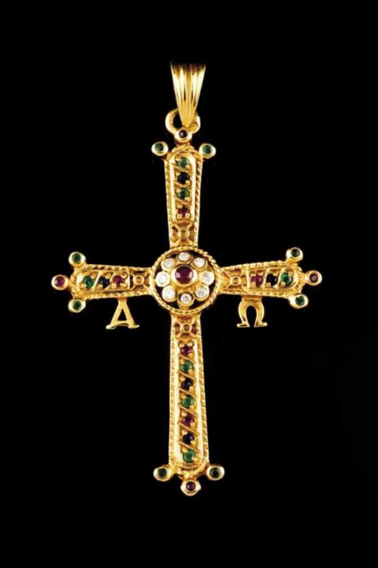 A cross-shaped pendant Set in gold with small brilliant cut diamonds, rubies, sapphires and emeralds