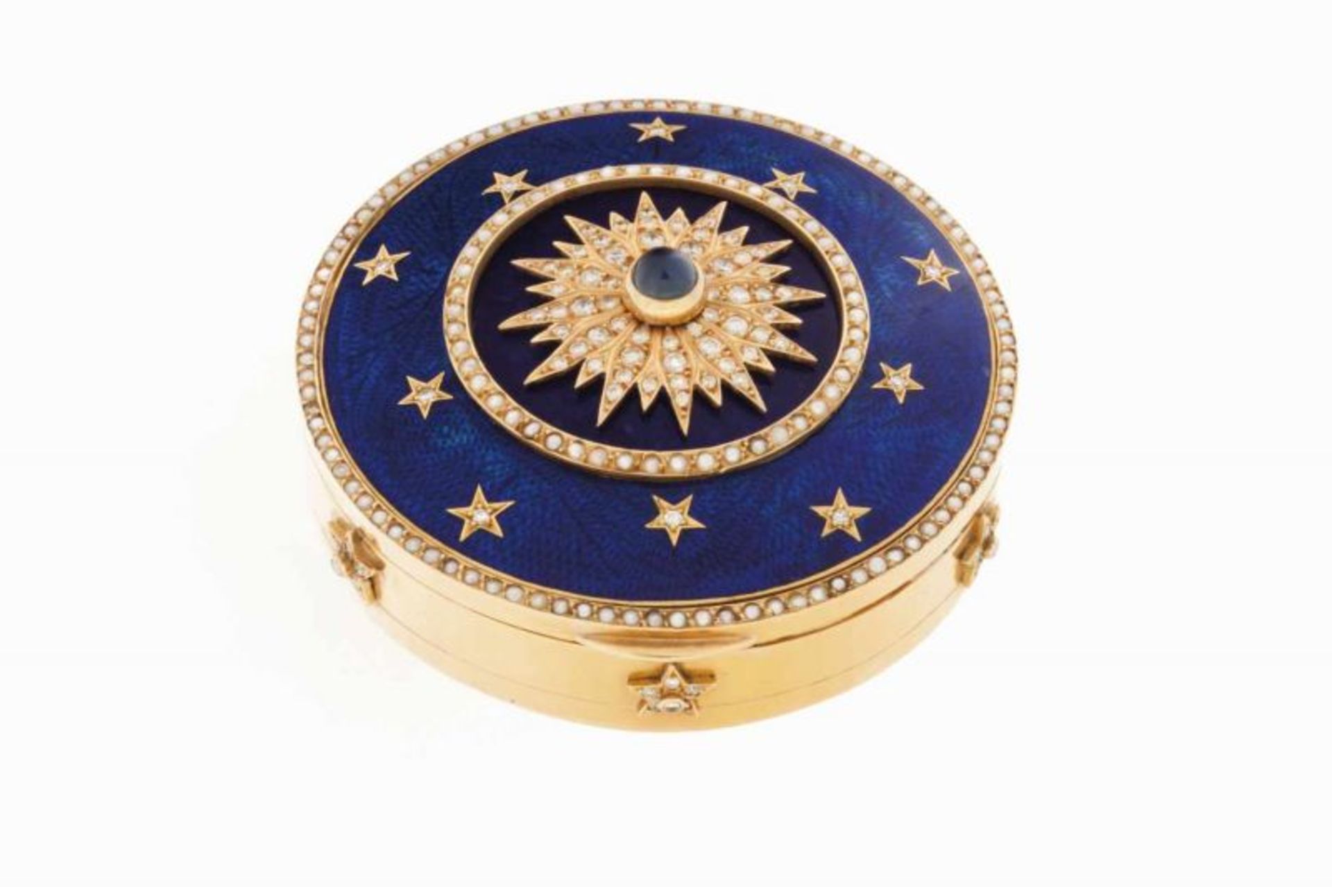 A vertu box 18kt gold partly enameled in cobalt blue, decorated with five-pointed stars and one