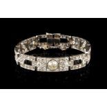 An Art Deco bracelet Pierced platinum set with approx. 120 antique brilliant cut diamonds (ca. 5,