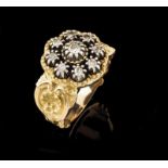 A D. João V style ring Chiselled gold decorated with volutes, shell and floral motifs, set in silver