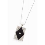 A pendant White gold chain, platinum pendant set with onyx plaque and 104 brilliant cut diamonds (