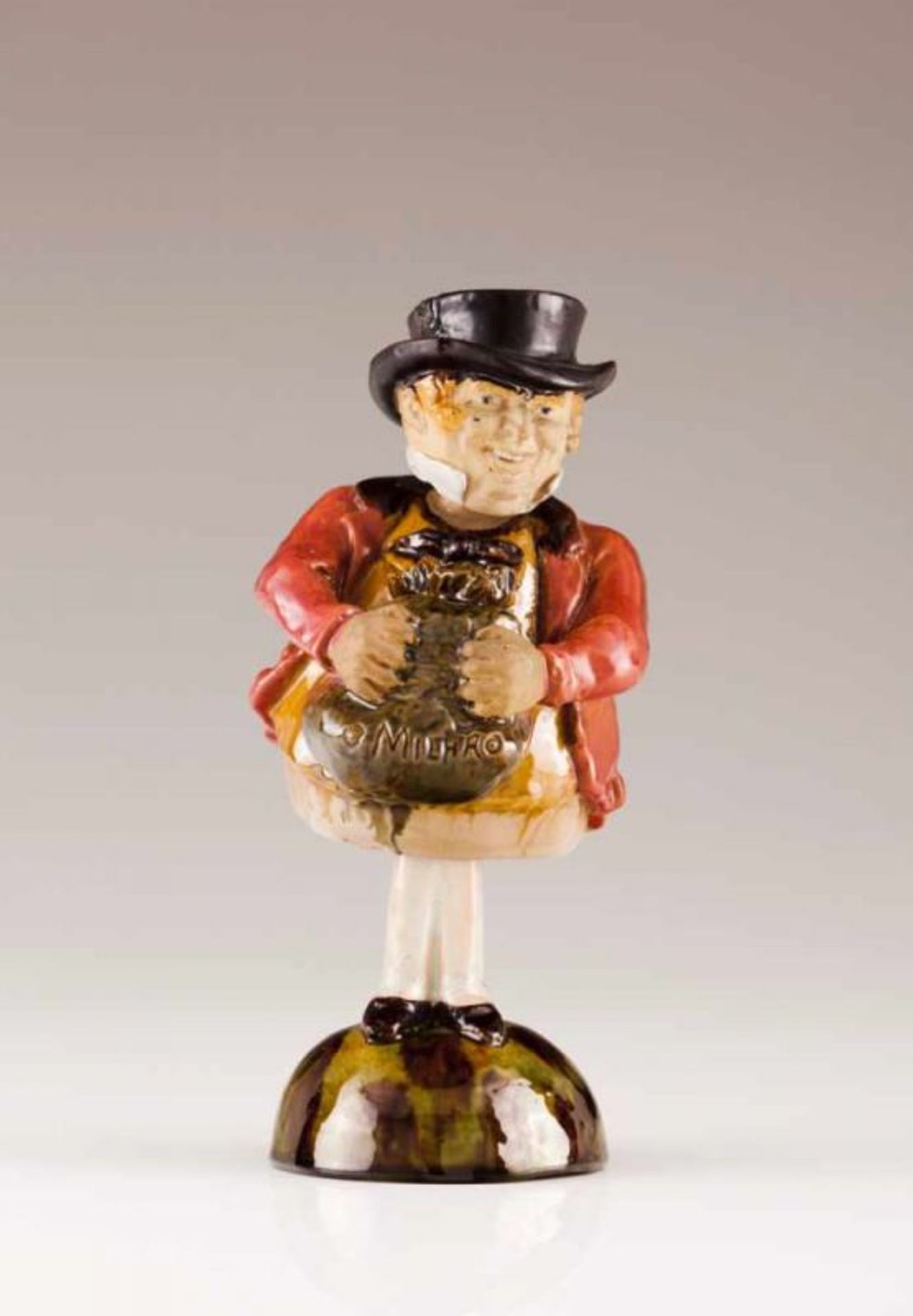 "The Million" An articulated Portuguese faience sculpture Representing "John Bull" holding a money