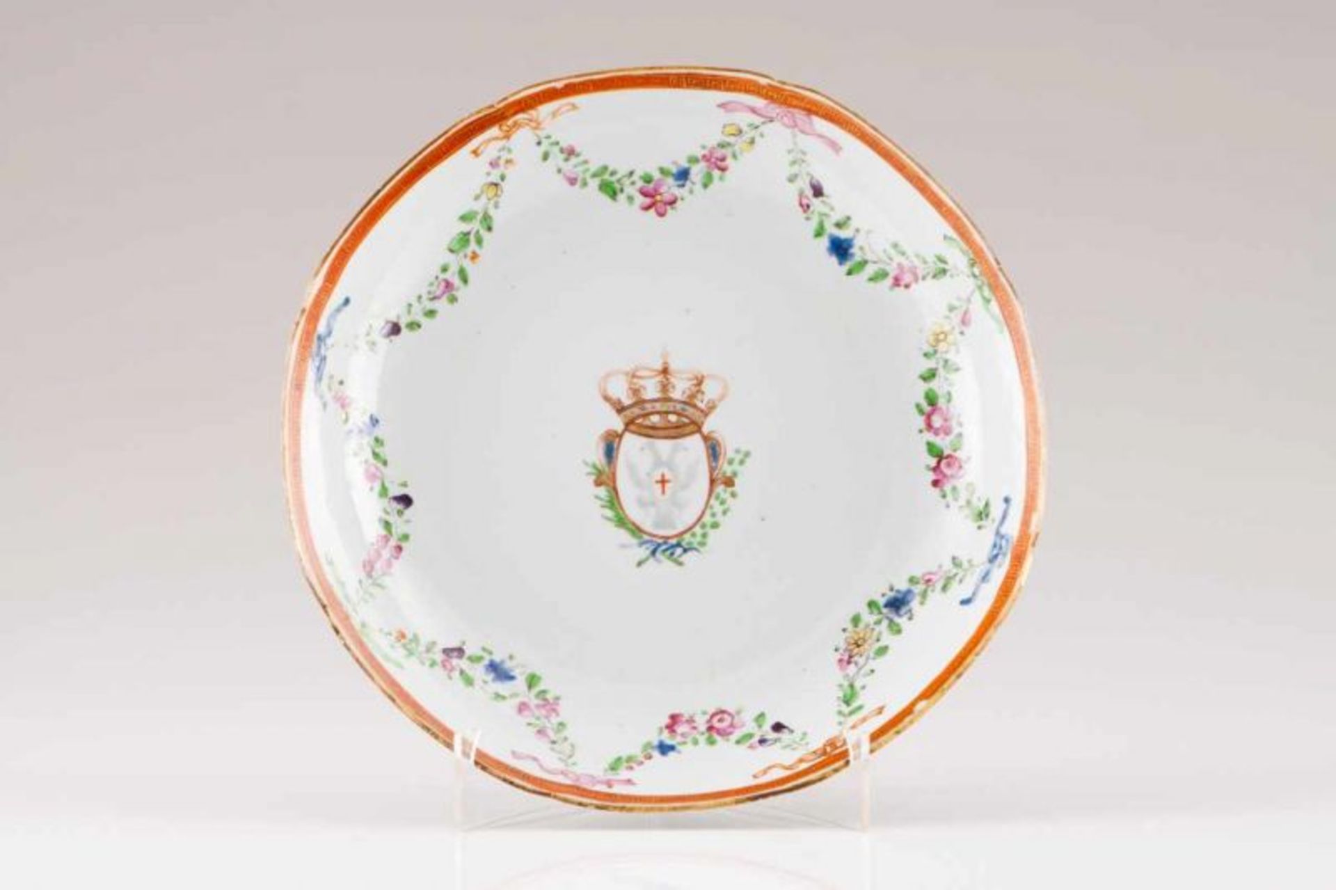 A saucer Chinese export porcelain Polychrome decoration, bearing coat-of-arms of the Order of