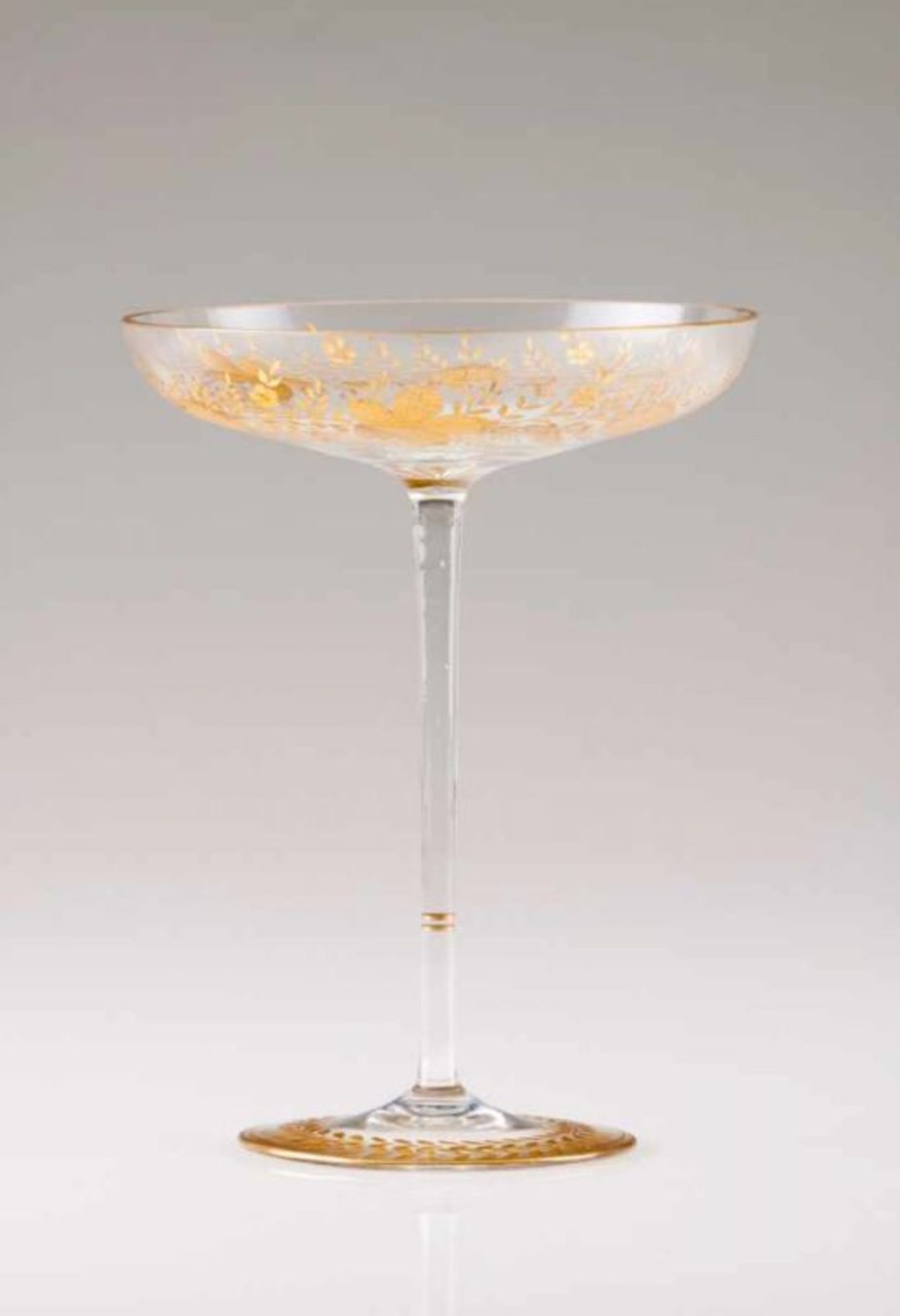 A tazza Glass Engraved and gilt decoration Europe, late 19th, early 20th century Height: 22,5 cm