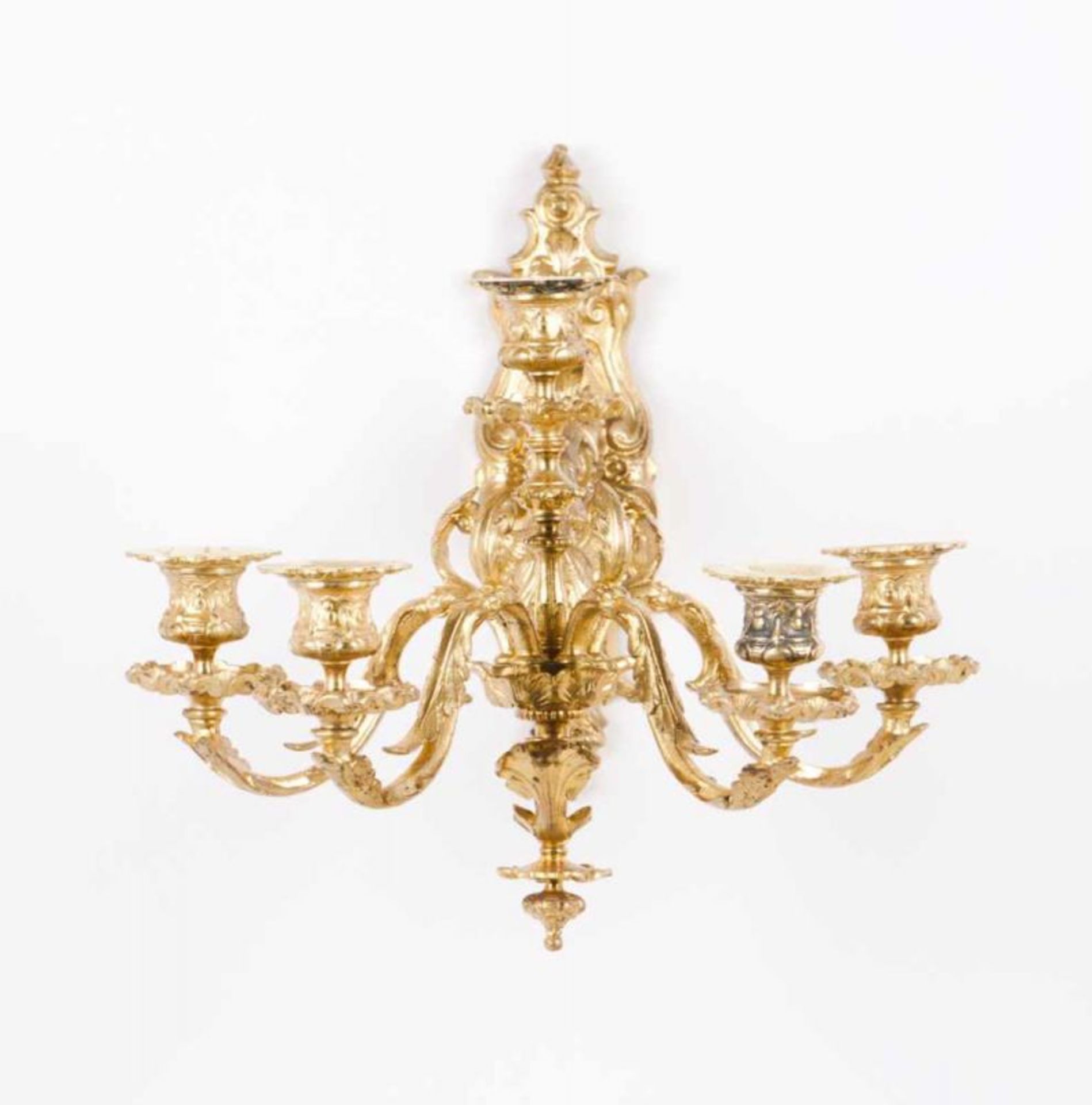 A pair of five-light wall sconces in the Louis XVI Style Chiselled and gilt bronze Decorated with