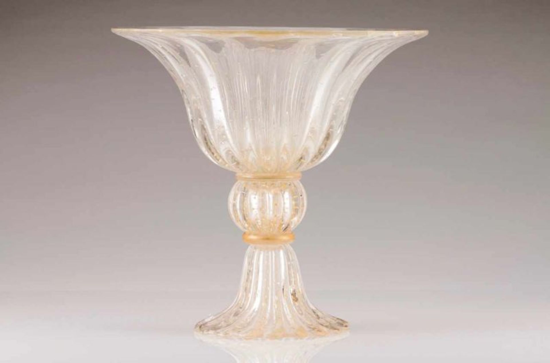 A large Murano bowl Molded glass with golden inclusions Italy, 20th century Height: 43 cm