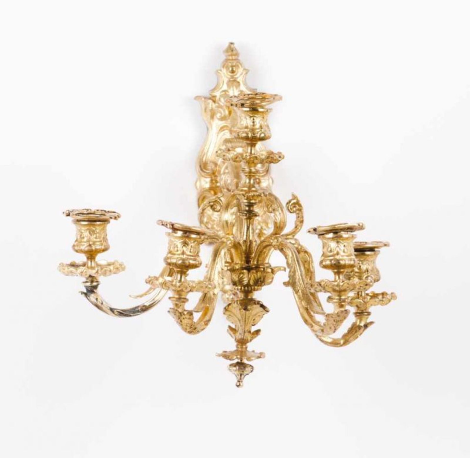 A pair of five-light wall sconces in the Louis XVI Style Chiselled and gilt bronze Decorated with