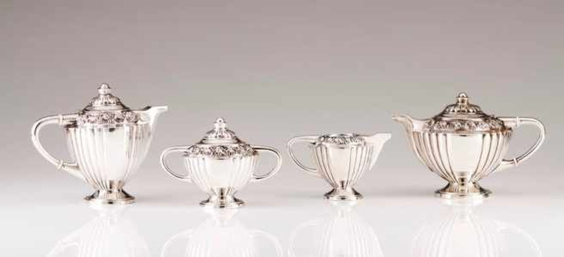 A Retro coffee and tea set Portuguese silver Geometric model with partly fluted decoration and