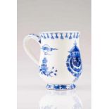 A mug European porcelain Blue decoration depicting floral motifs and French royal coat-of-arms