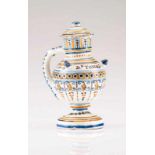 A traditional ewer Spanish faience Polychrome decoration in blue, yellow and orange With inscription