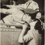 Ed Sullivan () Elvis Presley kissing fan Lillian Portnoy at the Brooklyn Army Terminal in New York