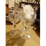 Three crystal wine glasses