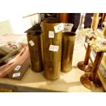 Three WWII brass shell cases