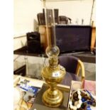 Large brass oil lamp with glass shade