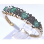 9ct gold emerald and diamond half eternity ring,