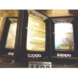 Four new boxed Zippo lighters