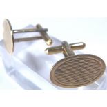 Pair of 9ct yellow gold and silver gents cuff links