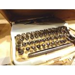 Ollivetti typewriter in case