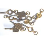 Box of eleven antique pocket watch keys,