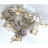 Sterling silver charm bracelet with assorted silver charms