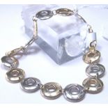 9ct yellow and white gold circular link bracelet RRP £360