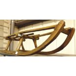 Wooden sledge with steel runners