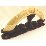 Japanese finely carved boars tusk showin