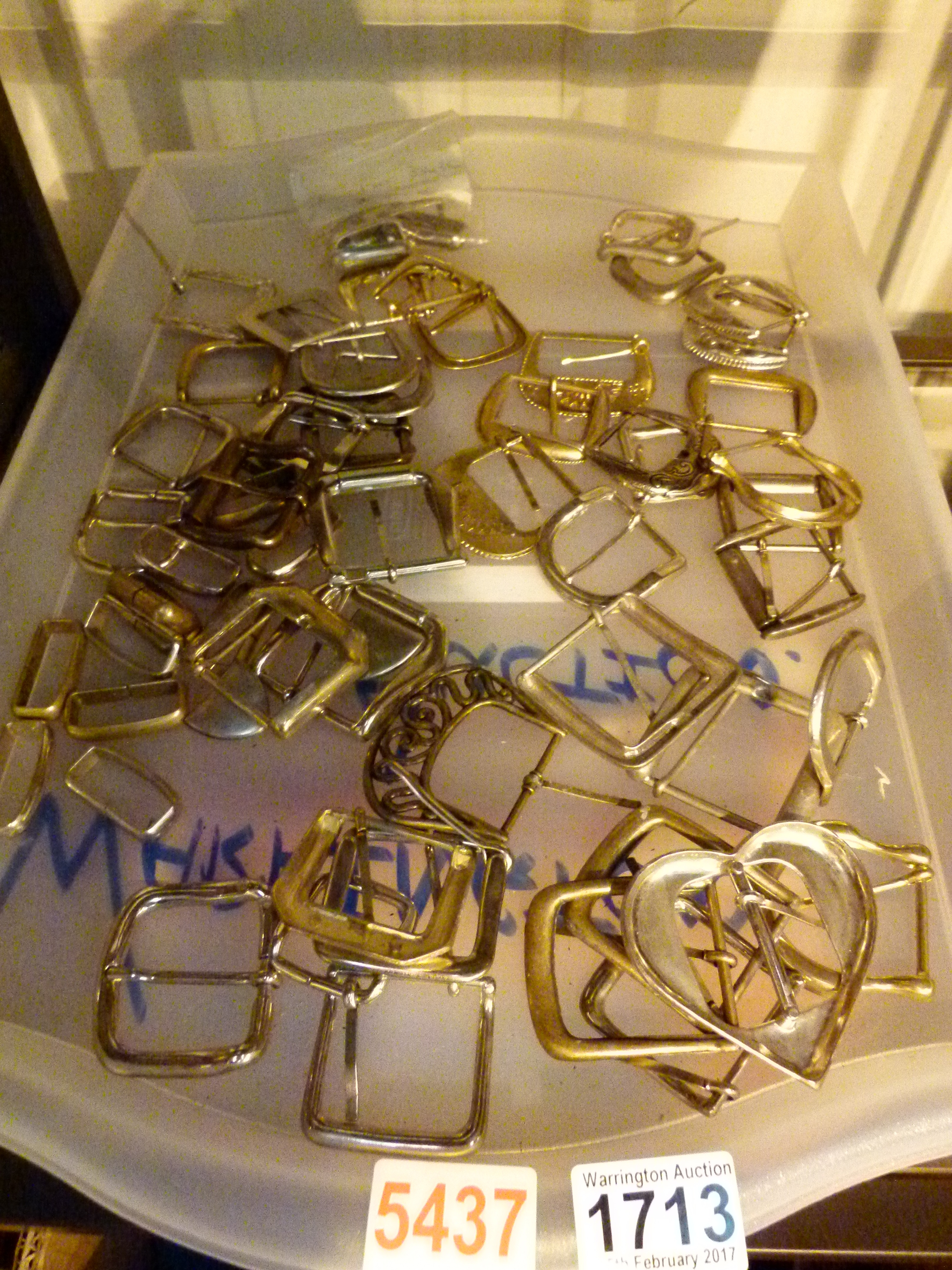 Tray of new belt buckles