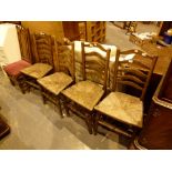 Four rush seated ladderback chairs and o