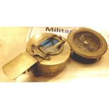 Two brass compasses