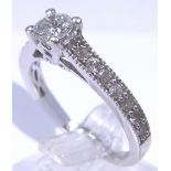 14ct white gold 0.6ct diamond ring, 0.35